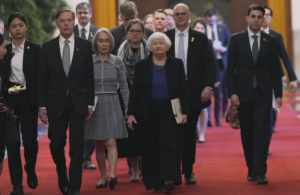  Janet Yellen, center, walks near U.S. Ambassador to China Nicholas Burns